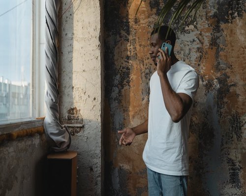 Person standing while taking a call