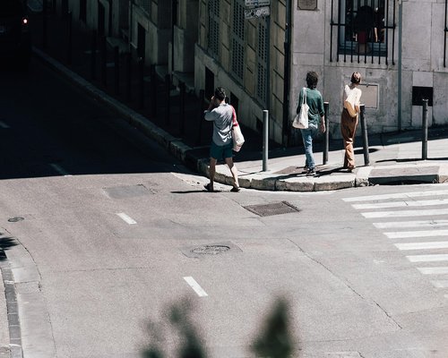 Person walking comfortably on city sidewalk